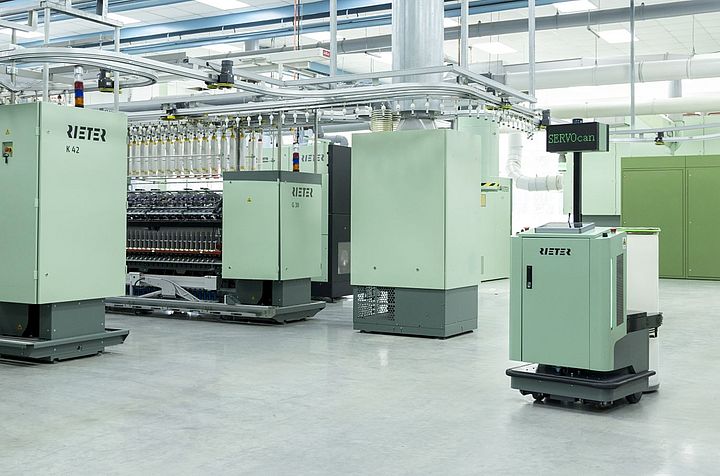 Towards the Small Spinning Mill: Automatic can transport SERVOcan from Rieter at work in a spinning mill.