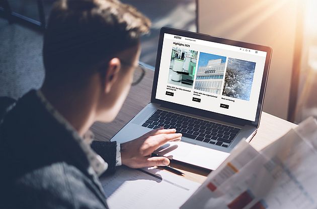 Man reading Rieter's annual report 2025 online