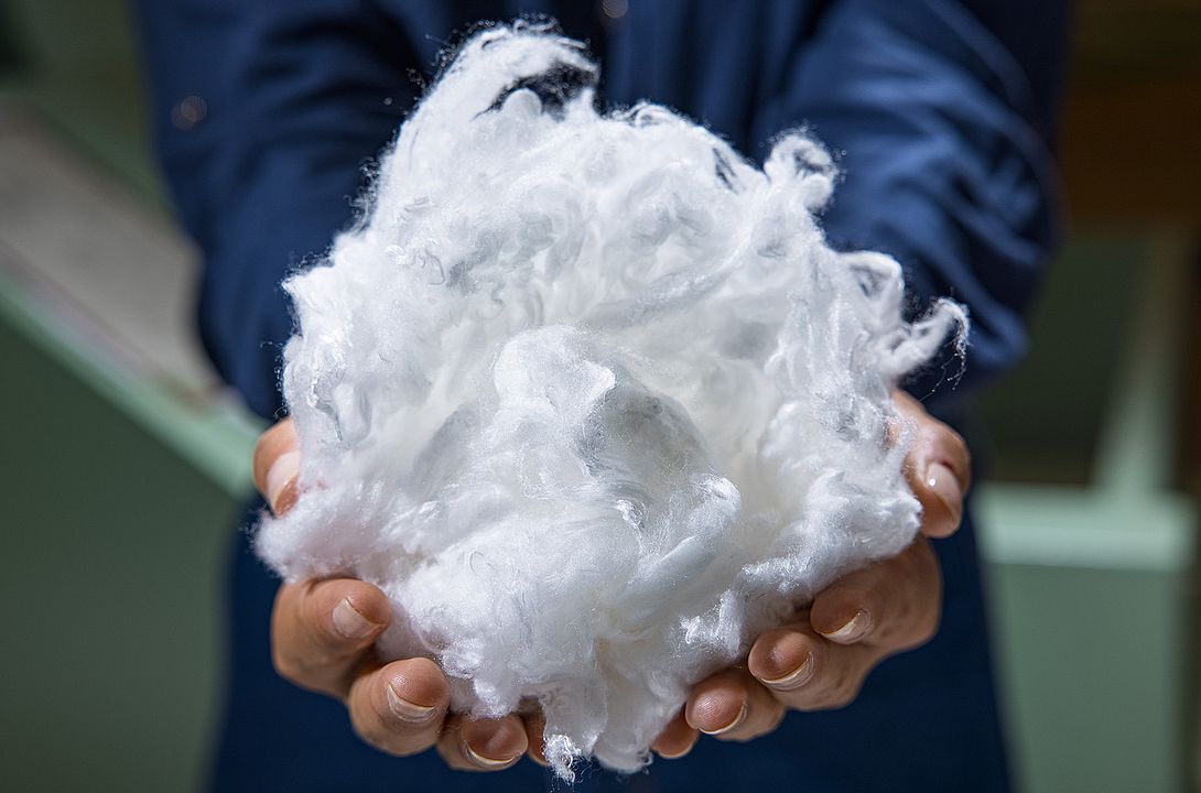 Hands hold viscose