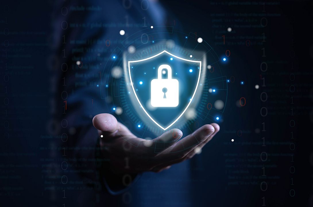 Symbol: Person holding a digital lock in hand.