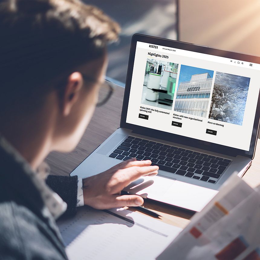 Man reading Rieter's annual report 2025 online